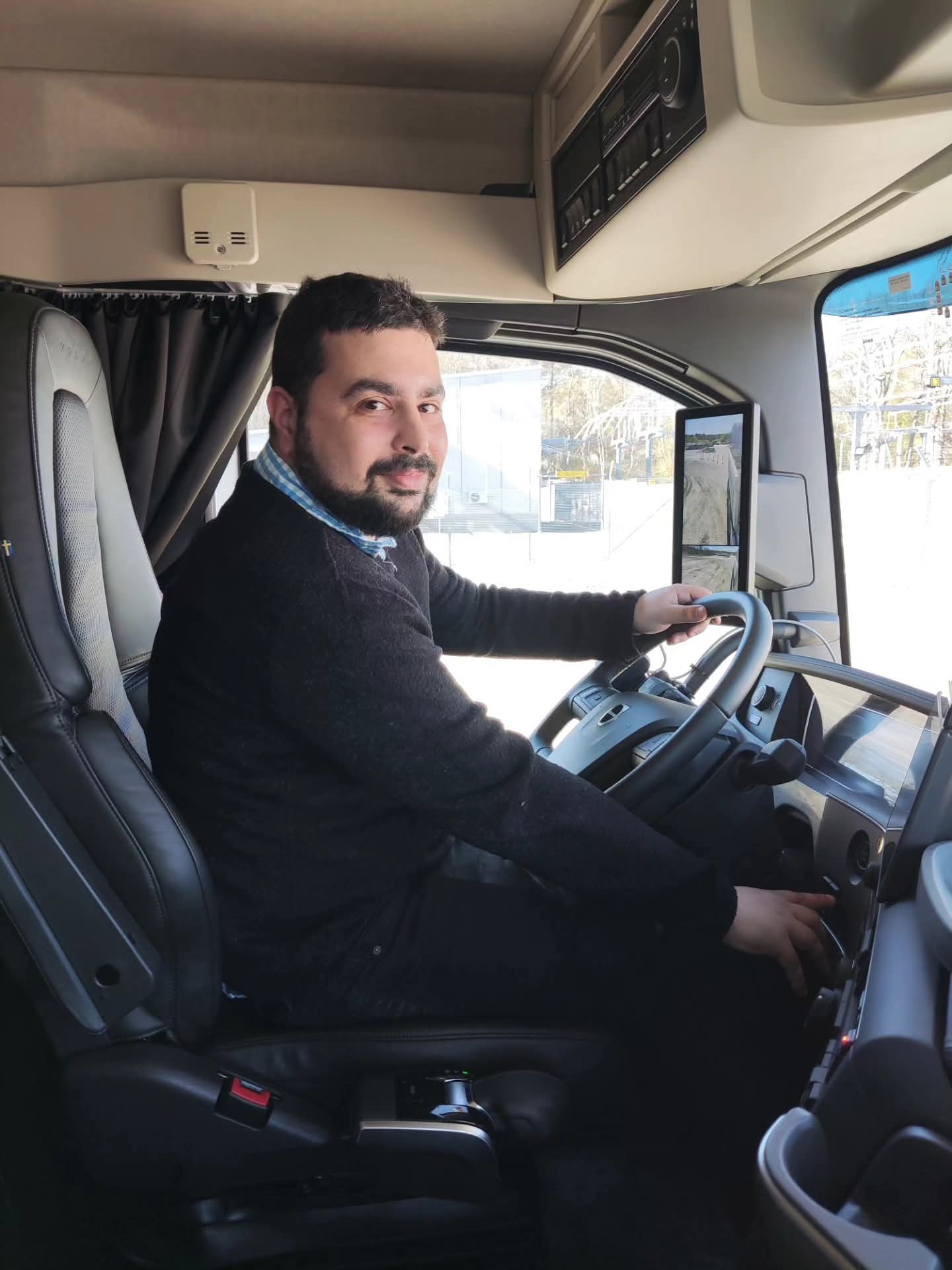 Alessio Amato inside a Volvo truck at the Volvo Trucks Experience Center in Göteborg